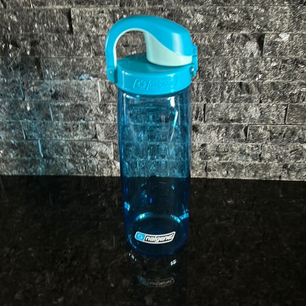 Nalgene On The Fly BPA-Free Water Bottle. 24 oz. On hand closing flip top. Blue.